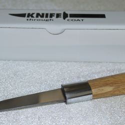 Knife Through Coat by Amazo Magic